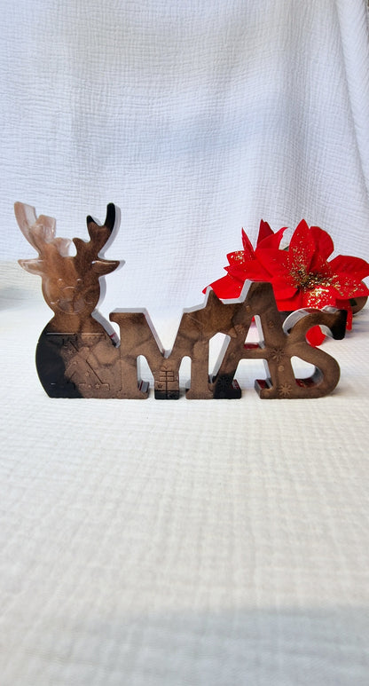 Schriftzug "Xmas" in verschiedenen Varianten