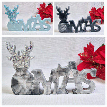 Schriftzug "Xmas" in verschiedenen Varianten